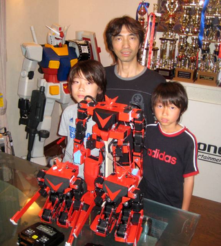 Illustration for article titled Girl Pilots Japanese Fighting Robot With Gundam Master/Slave Control Suit
